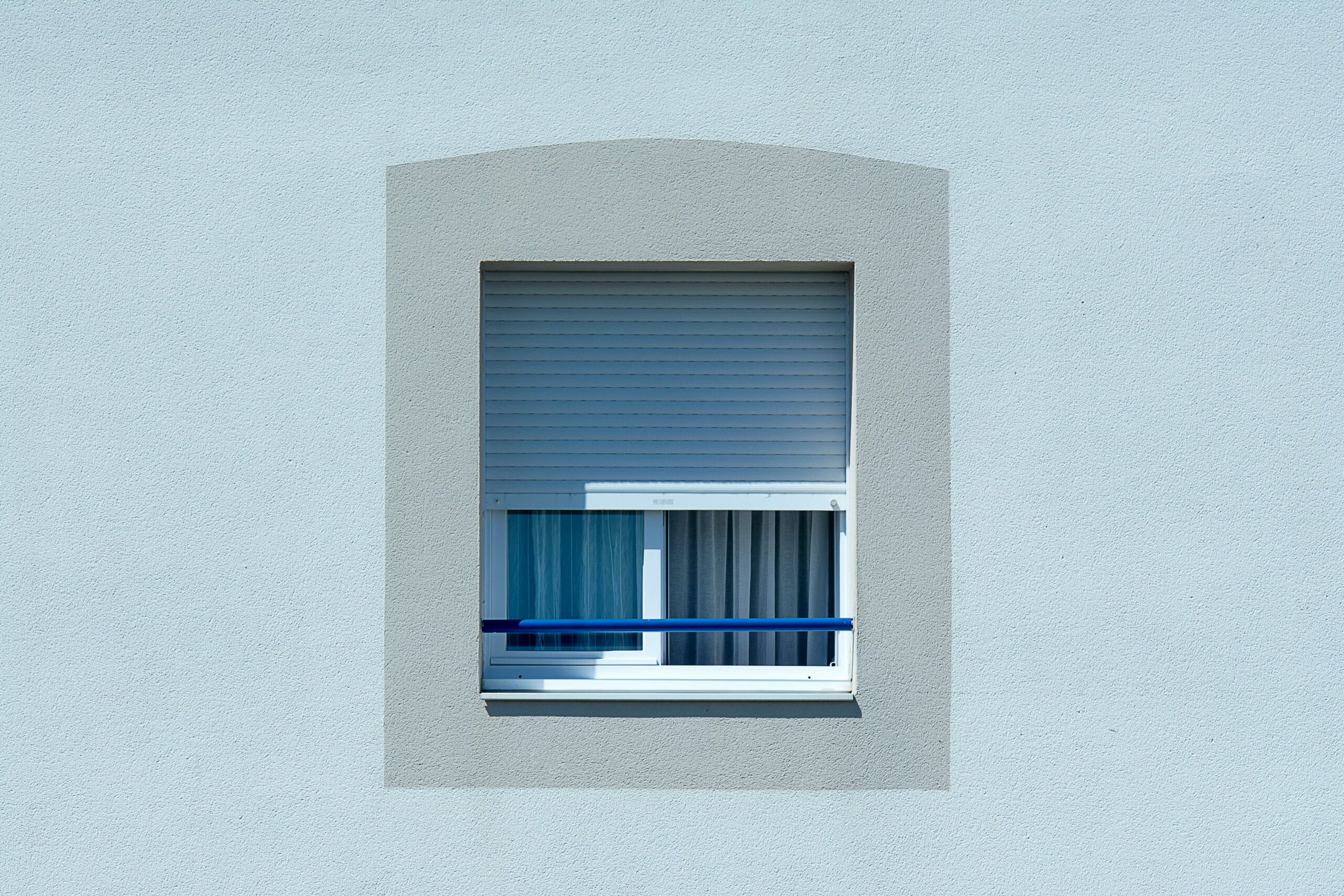 A Window with Roller Blinds