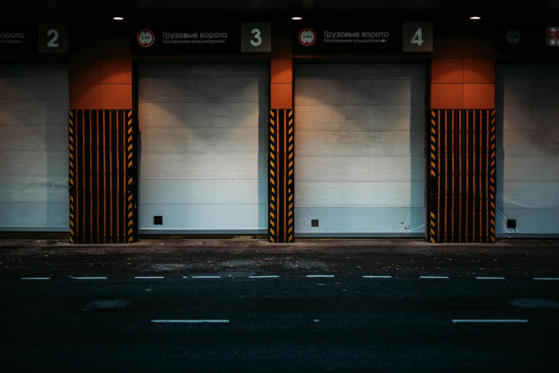 Garage gates near road in city